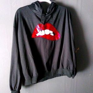 Sequined lips sweatshirt as 2x runs small